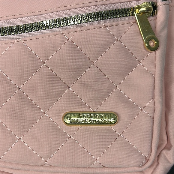 Pink Cross Body Backpack with gold zipper pockets - Picture 5 of 8
